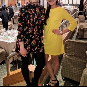 Yellow mid-sleeve dress with button detail